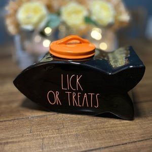 Rae Dunn
Lick Or Tricks Fish Shaped Canister.  10w x 5.5”h